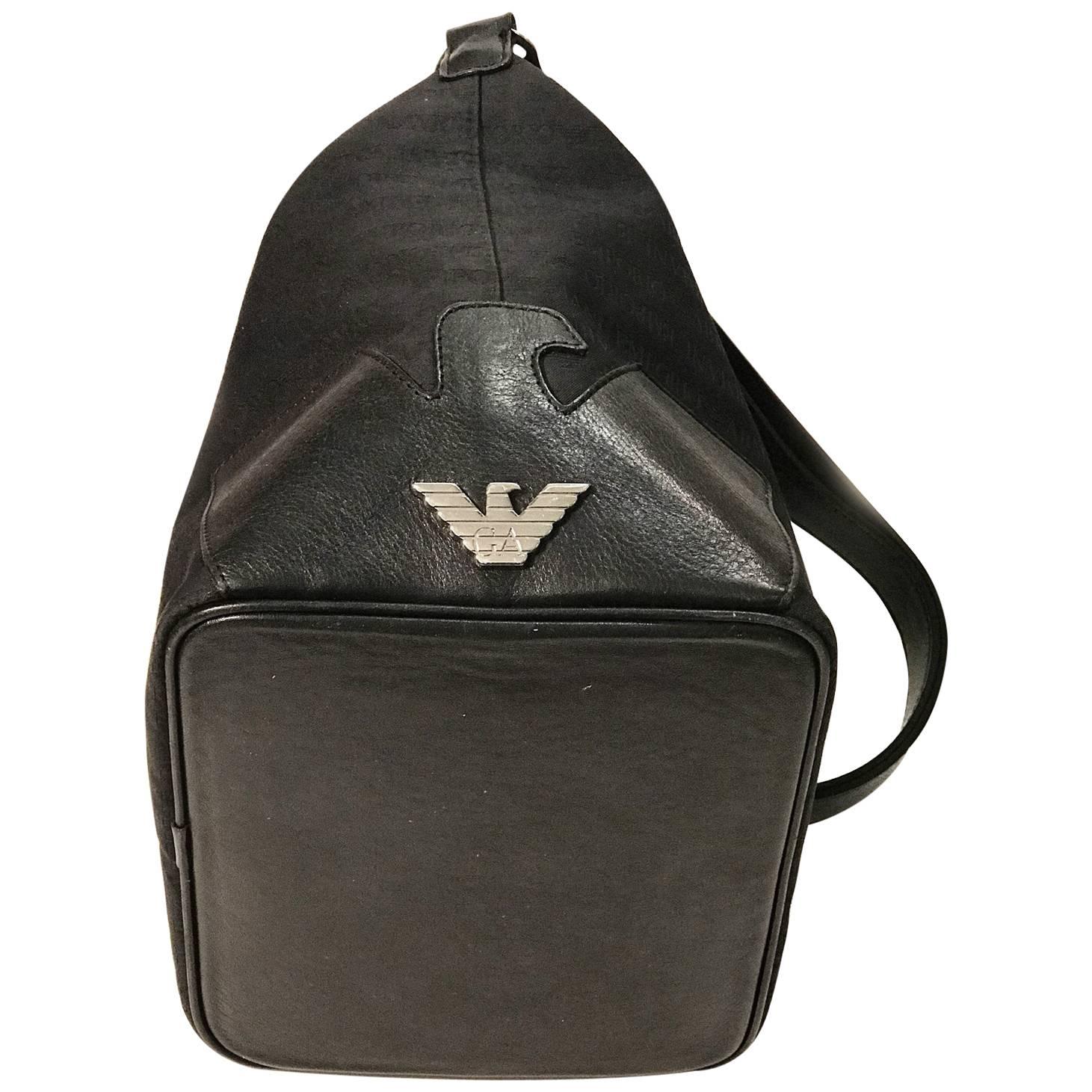 Emporio Armani black canvas with monogram pattern shoulder bag. For Sale