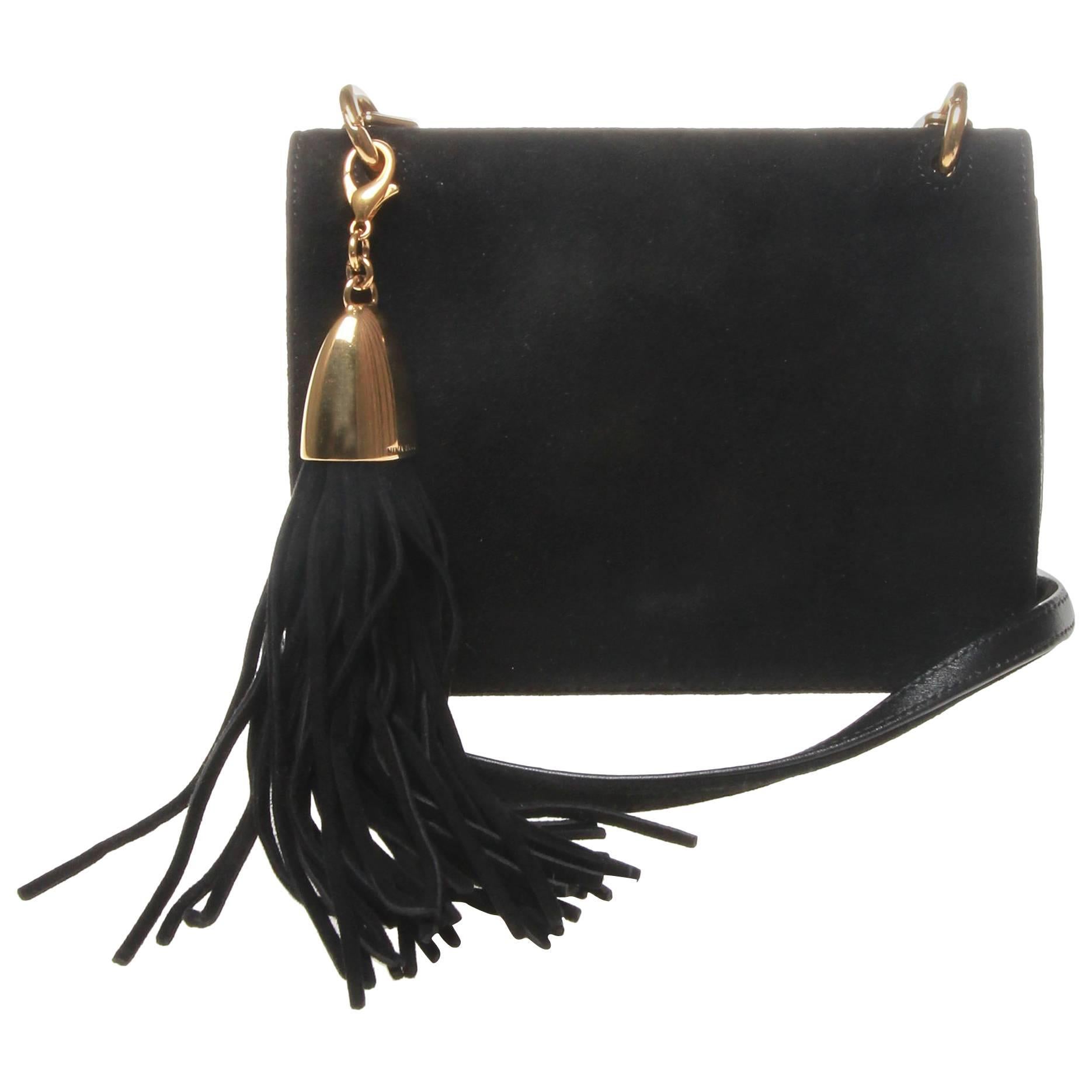 	Nina ricci black mini lambskin bag