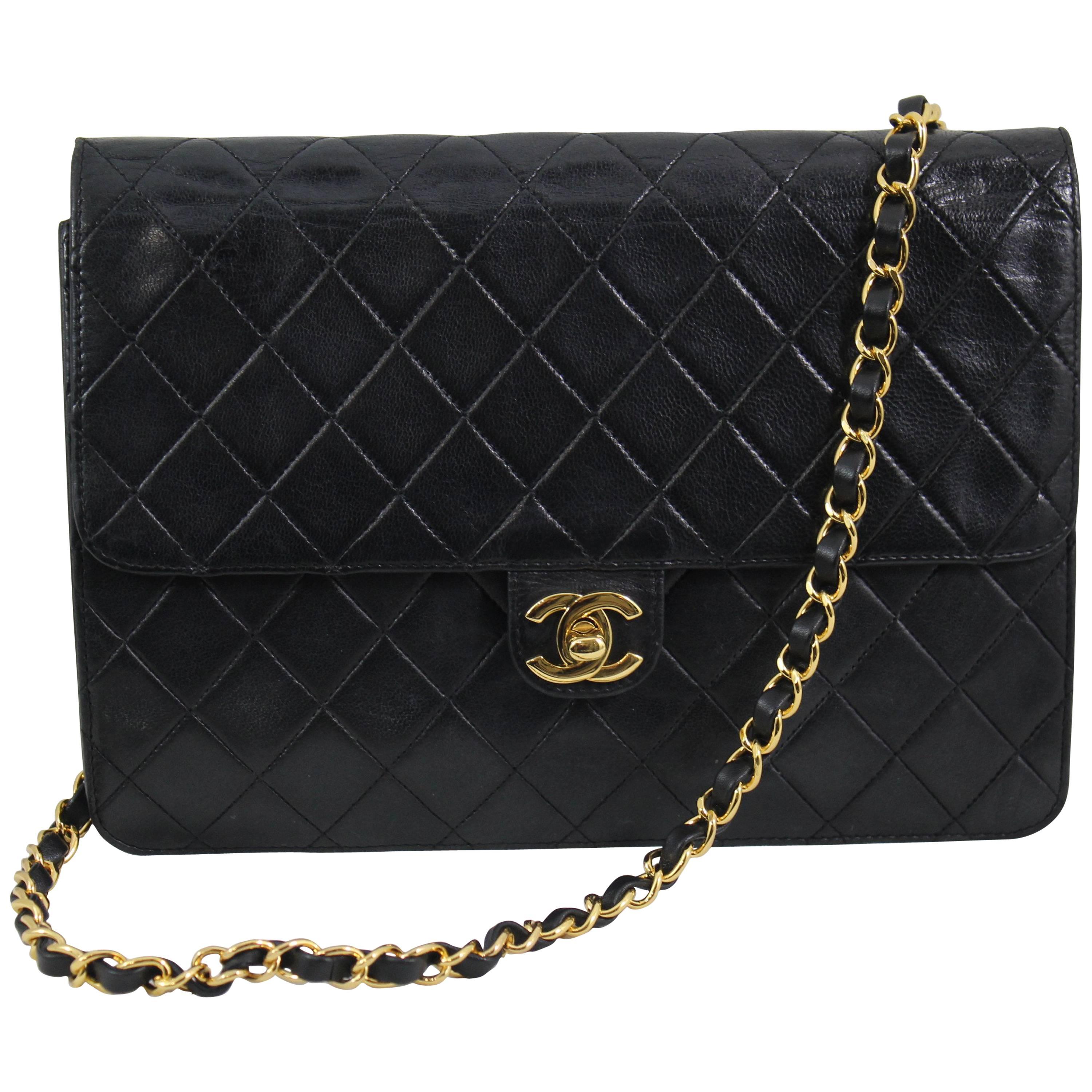 Vinatge Chanel Black Leather Shoulder Bag. New Clasp and chain For Sale