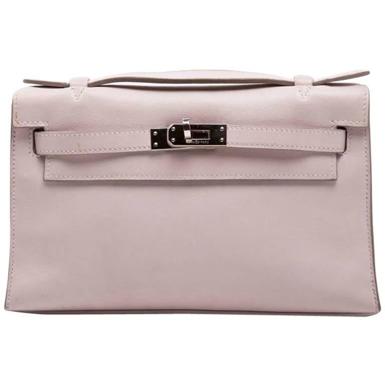 HERMES Kelly Clutch in Pink Swift Calf leather