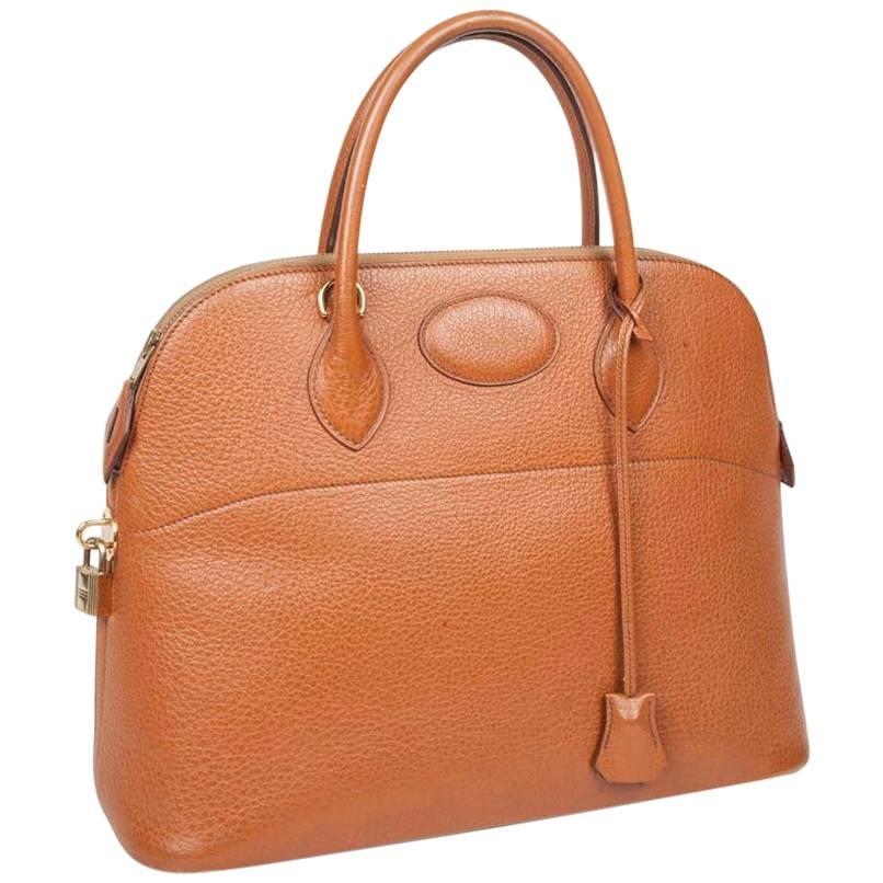 HERMES Vintage 'Bolide' bag in Cannelle Grained Leather For Sale