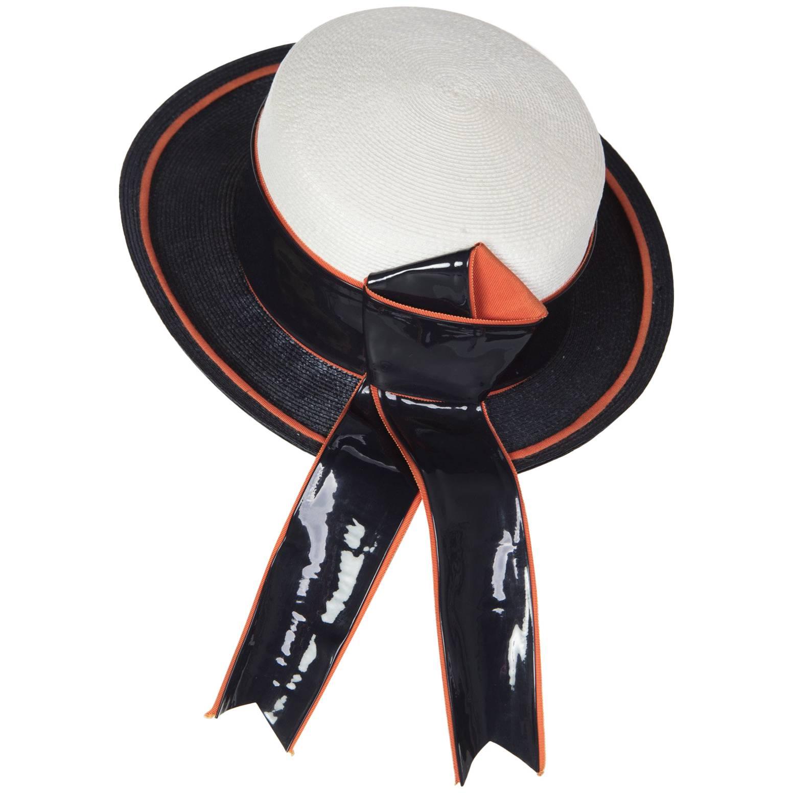 1960s Yves Saint Laurent Ivory and Navy Derby Hat Patent Leather Orange Hatband For Sale