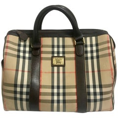 Used Burberry classic beige and brown nova check handbag. Unisex purse.