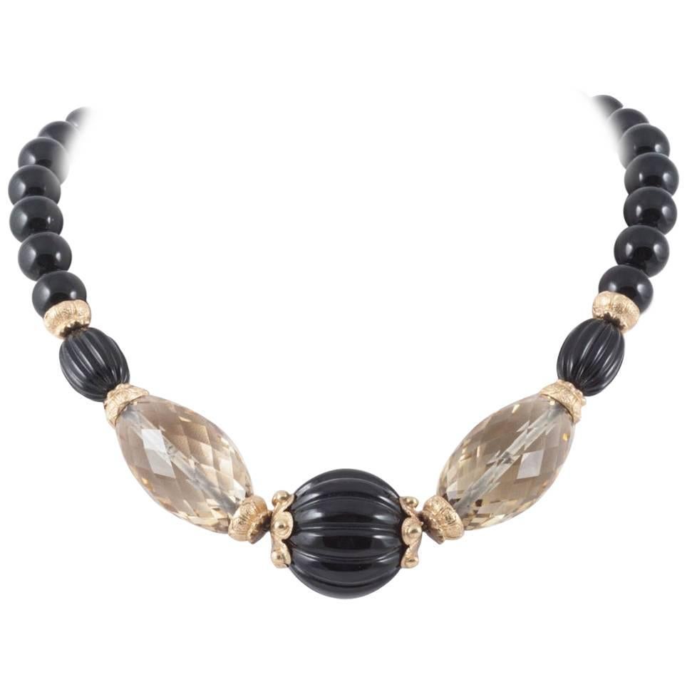  Carved onyx and citrine beaded necklace with silver gilt clasp and beads, 1980s