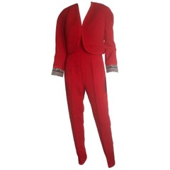 Gianni Versace red jumpsuit and matching glasses cropped bolero jacket 