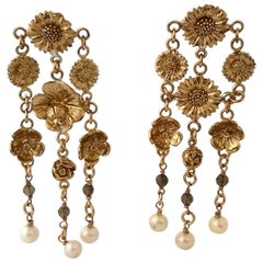 Boucles d'oreilles chandelier en bronze de Patrizia Daliana