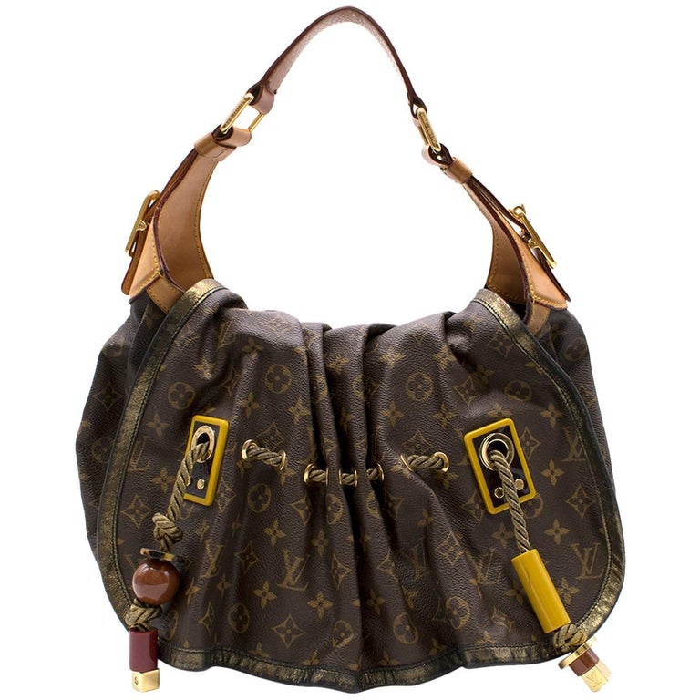 Louis Vuitton Canvas Monogram Bag with Gold Accents For Sale at 1stDibs  louis  vuitton gold monogram bag, louis vuitton with tassels, louis vuitton bag  with tassel
