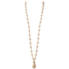 Spring 1994 Chanel pearly beads long necklace with “calisson” shaped pendant