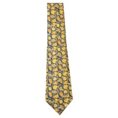 HERMES Vintage Tie in Yellow, Orange and Blue Printed Silk.