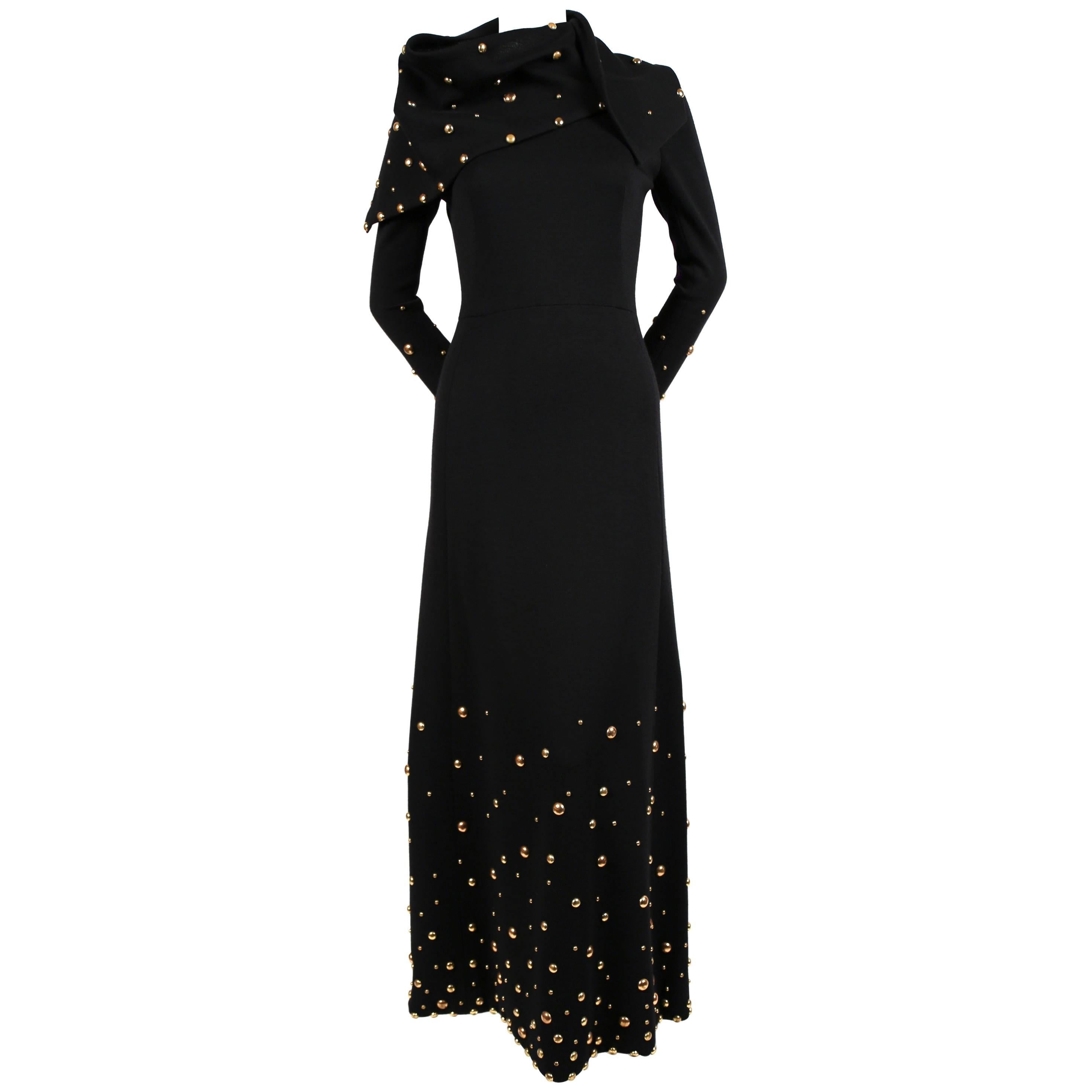 1970's GIVENCHY black wool dress with large gold studs
