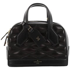 Louis Vuitton Dora Handbag Malletage Leather BB