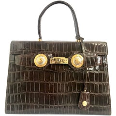 Vintage Gianni Versace dark brown croc embossed leather Kelly style bag.