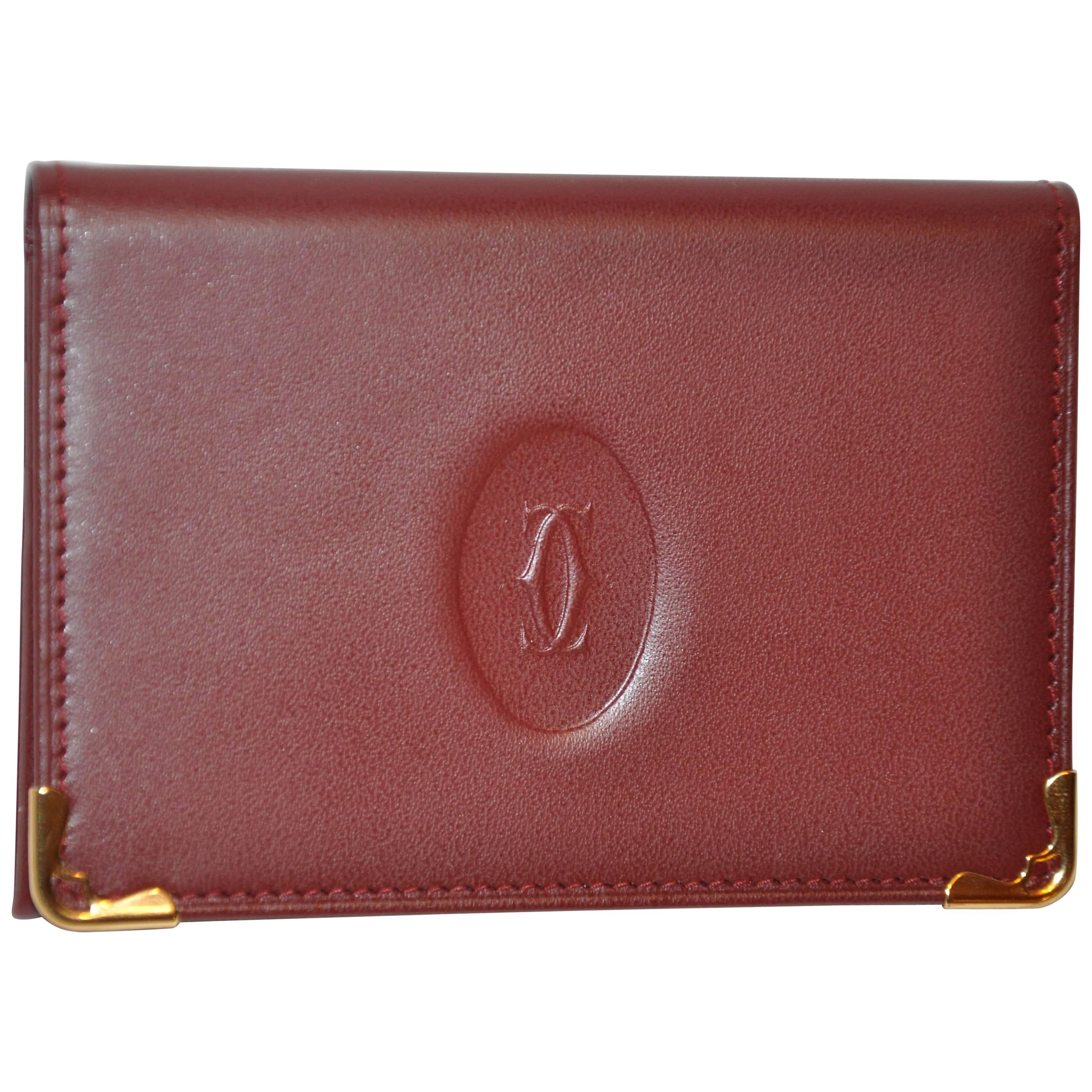 Cartier Burgundy Calfskin with Gold Hardware Accent Credit Card Wallet For Sale