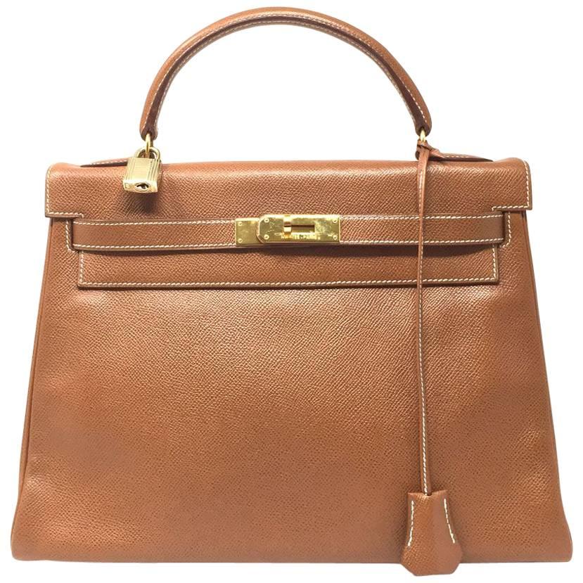 1992, HERMES Vintage  Sac Kelly 32 bag in Courchevel Gold Leather. 