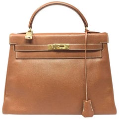 1992, HERMES Vintage  Sac Kelly 32 bag in Courchevel Gold Leather. 