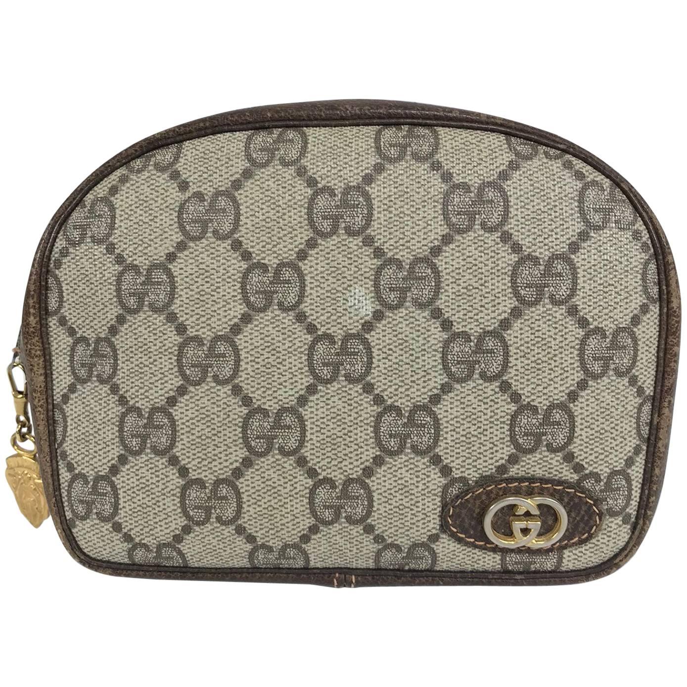 Vintage Gucci small leather and monogram vinyl cosmetic bag  For Sale