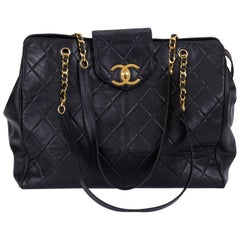 1990's Vintage Chanel Black Quilted Oversized Weekender Luggage Travel Bag