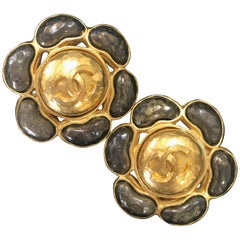 Vintage CHANEL large flower earrings with CC and gunmetal color gripoix stones.