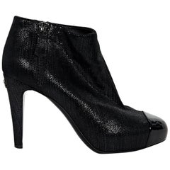 Black Chanel Embossed Cap-Toe Ankle Boots