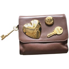 Moschino Vintage chocolate brown leather golden heart motifs clutch pouch