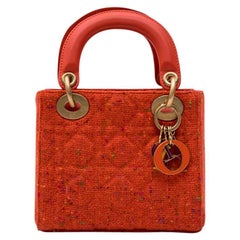 Mini sac CHRISTIAN DIOR 'Lady Dior' en tweed corail et cuir