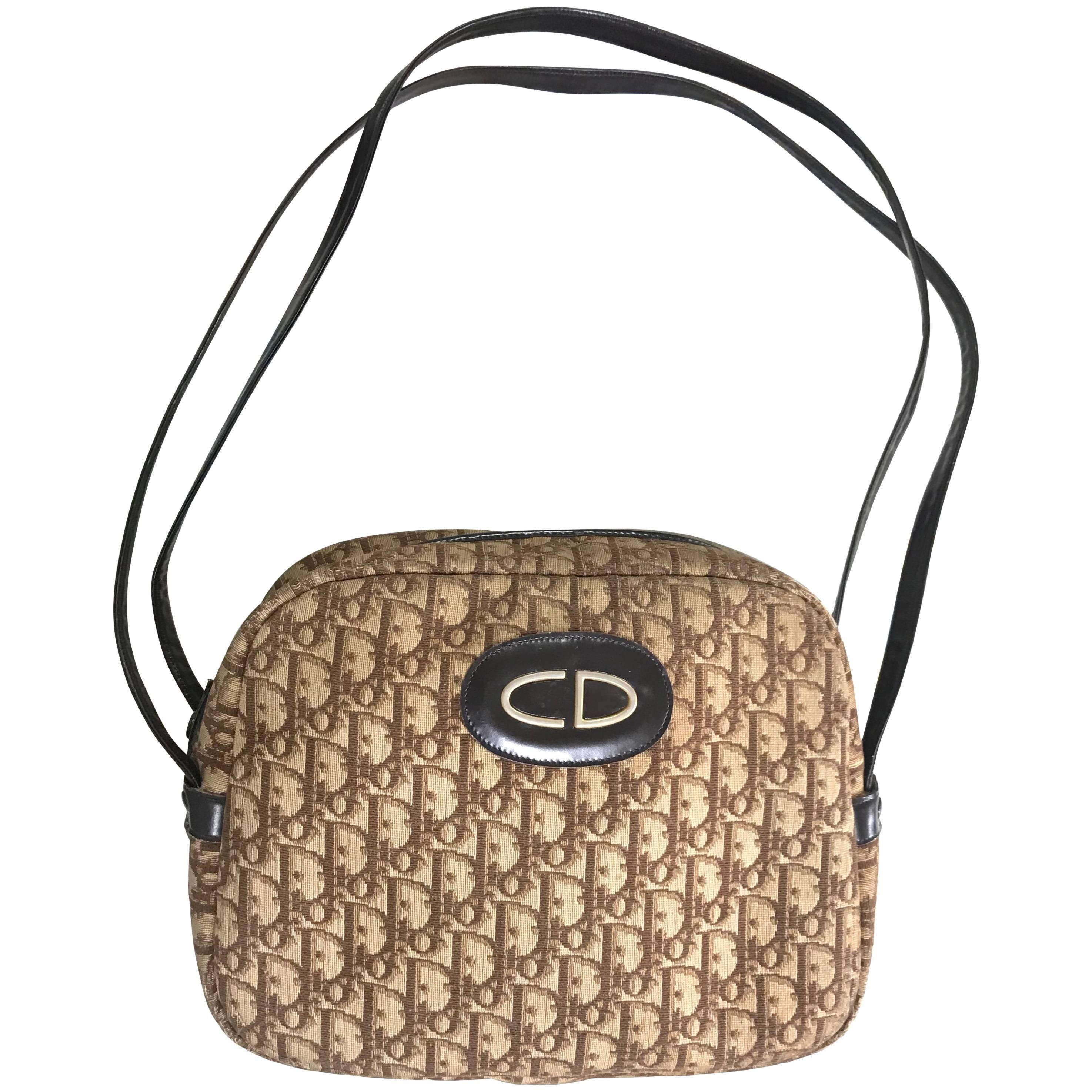 Vintage Christian Dior brown trotter jacquard handbag with logo motif.
