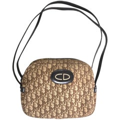 Retro Christian Dior brown trotter jacquard handbag with logo motif.