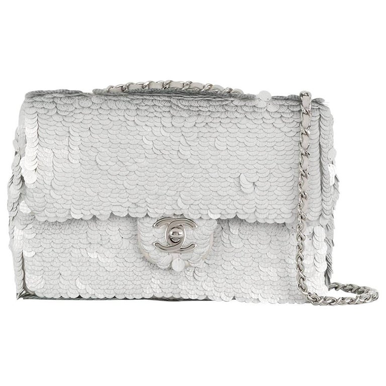 Sold at Auction: Chanel Silver Sequin New Mini Classic Flap Bag