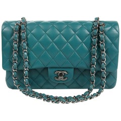 Chanel timeless double flap bag in turquoise Lambskin with gold hardware.