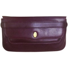 Cartier Retro Must de Cartier Leather Wine Color Clutch with gold tone charm 