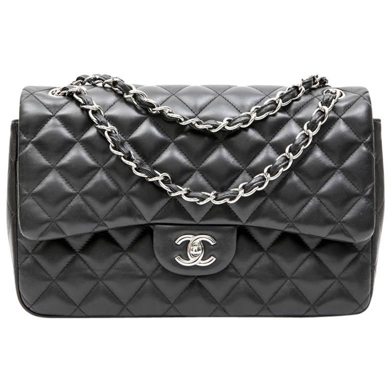 CHANEL Jumbo Double Flap Bag in Black Smooth Quilted Lamb Leather