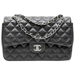 CHANEL Jumbo Double Flap Bag in Black Smooth Quilted Lamb Leather