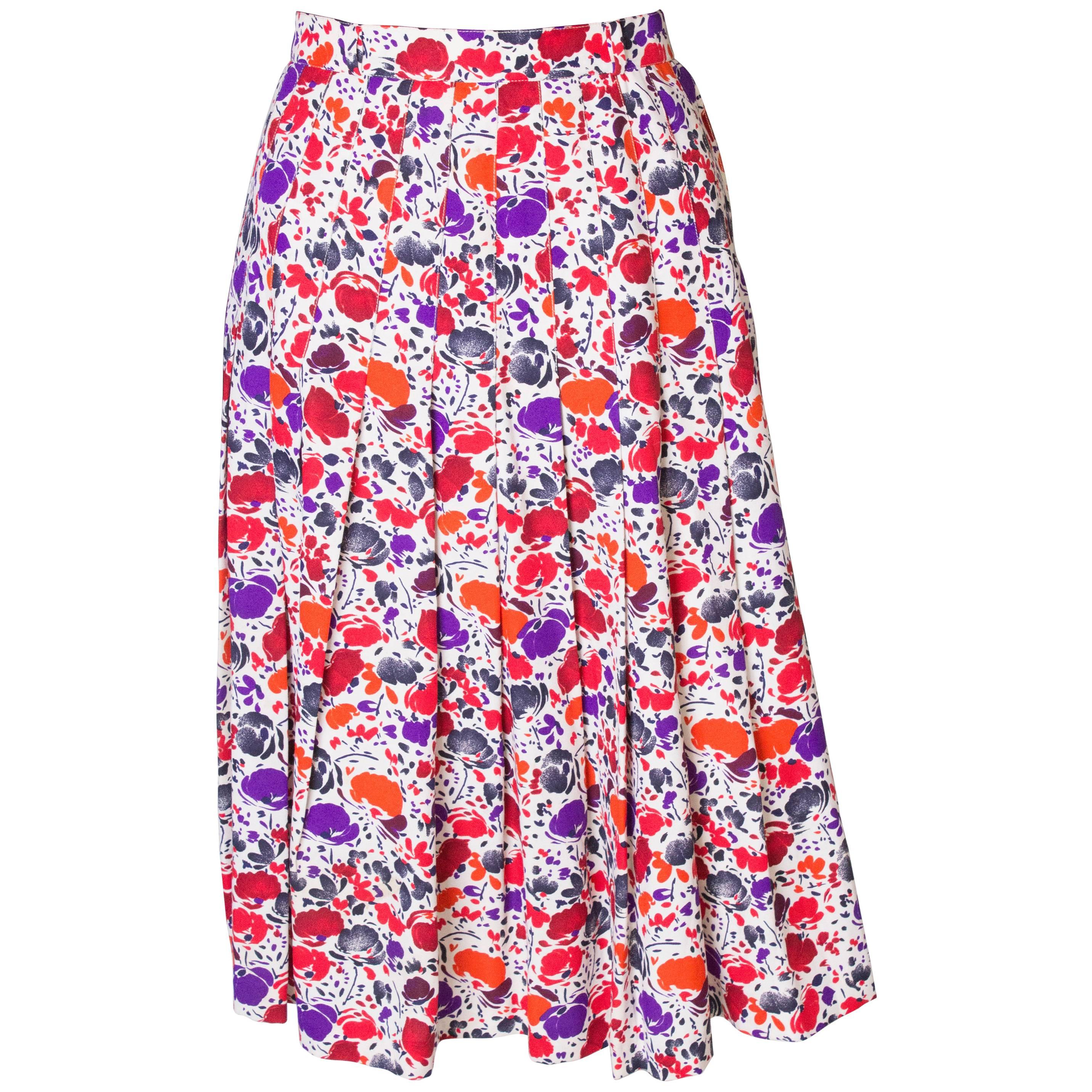A vintage 1980s floral printed pleated numbered Skirt by Jean Louis Scherer