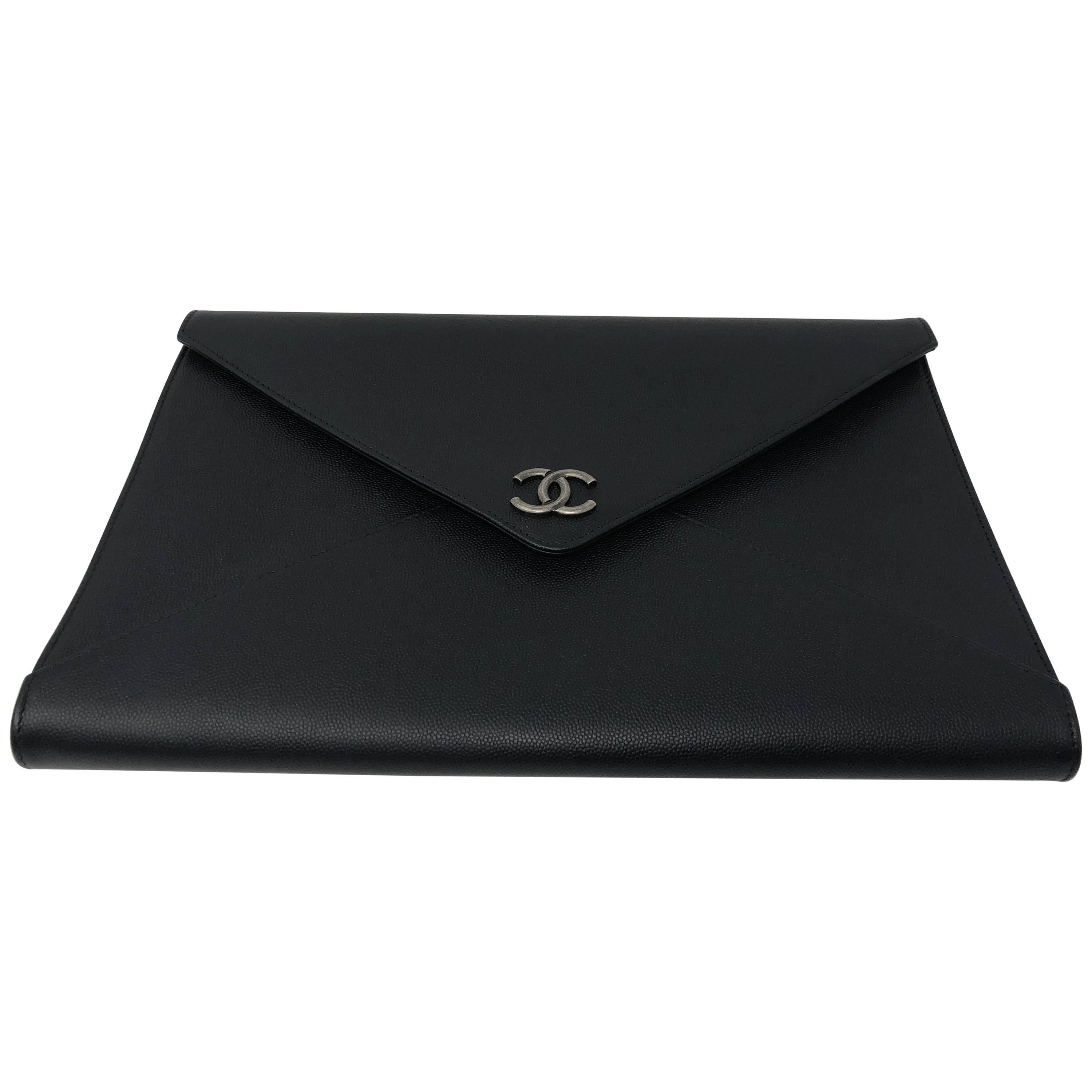 Chanel Black Leather Clutch at 1stDibs