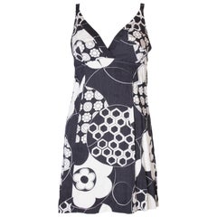 A Vintage 1960s black and white floral printed mini dress by Mr Leonard 