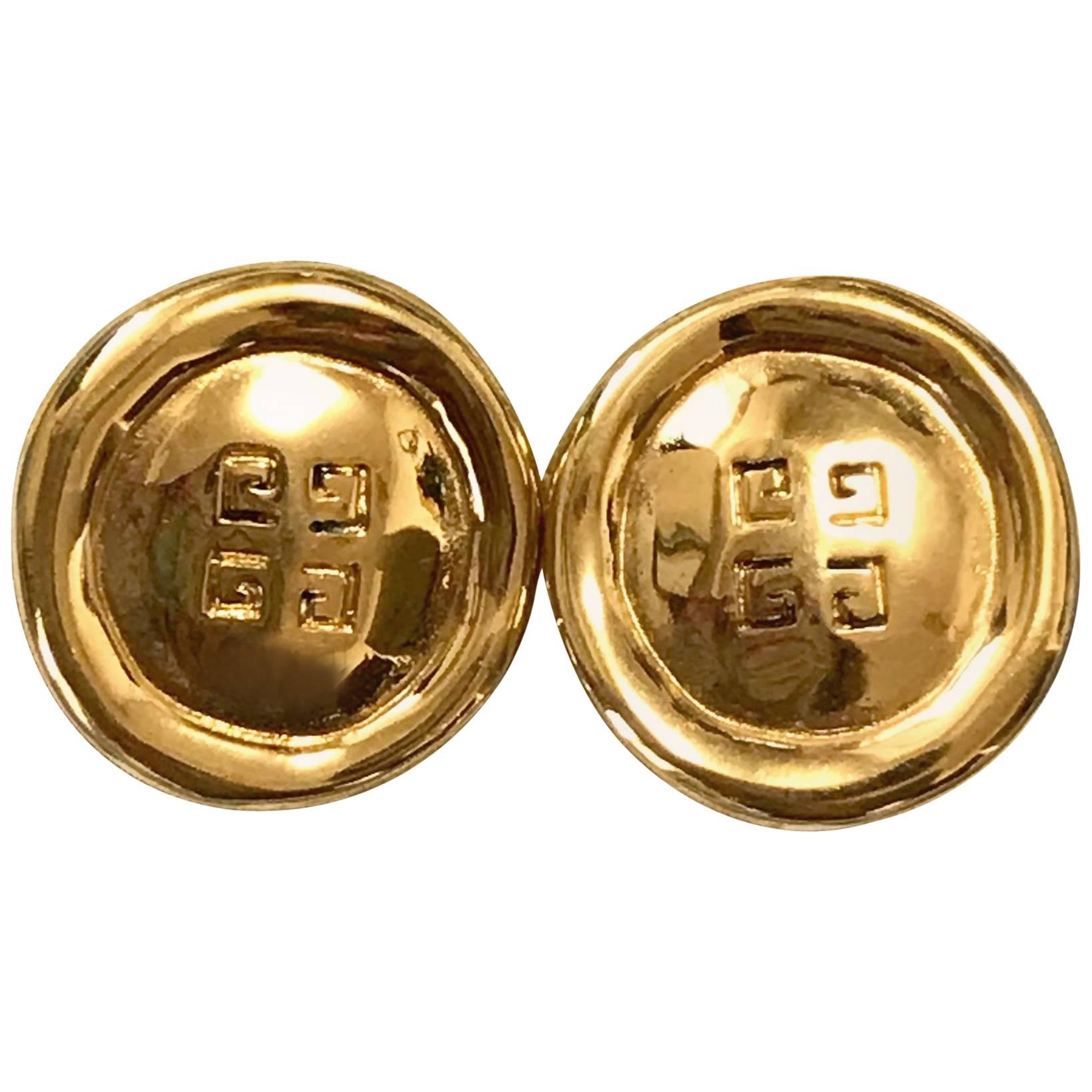 Givenchy Vintage golden round shape earrings with embossed logo mark  For Sale