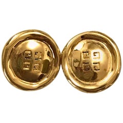 Givenchy Vintage golden round shape earrings with embossed logo mark 