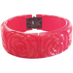 Art Deco heavily carved red clamper hinged bangle bracelet