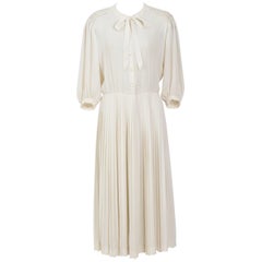 Nina Ricci 1970s cream crepe georgette pleated skirt pussy bow dress