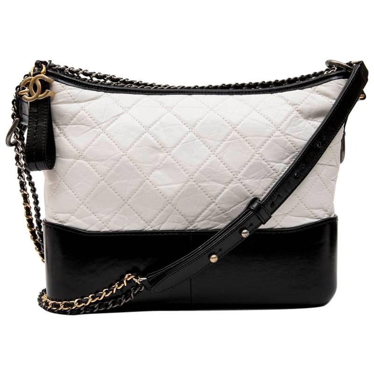Chanel Gabrielle Hobo Bag In Aged White Quilted Leather And Black Leather At 1stdibs Chanel Hobo Bag Chanel Gabrielle White Black Chanel Gabrielle Black And White
