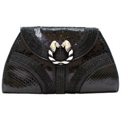 Bvlgari Python Embellished Lion Head Clutch Bag