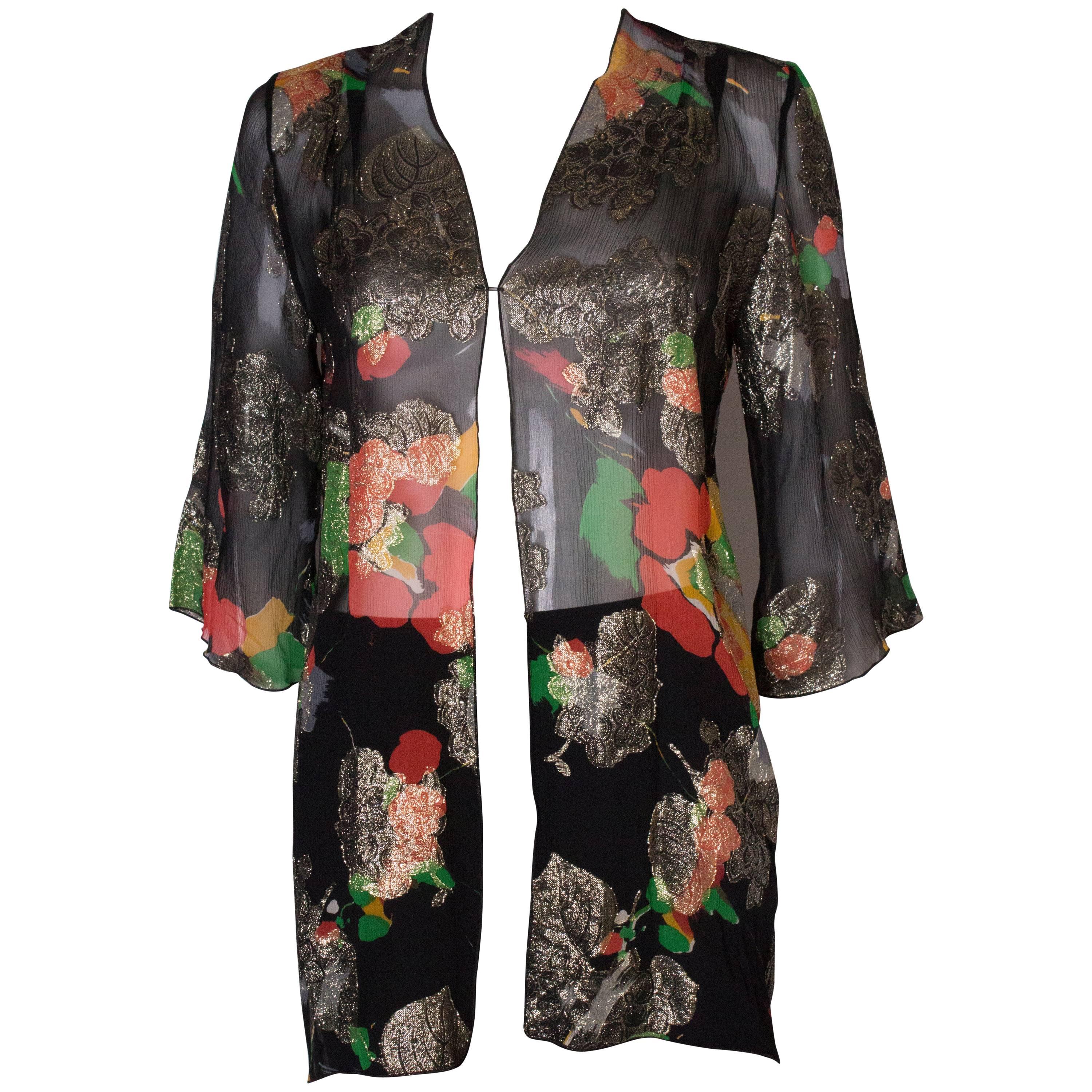 A Vintage 1980s lurex floral evening jacket by Caroline Charles 