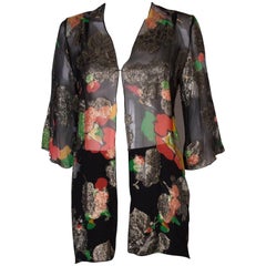 A Retro 1980s lurex floral evening jacket by Caroline Charles 