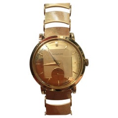Vintage A gentleman's 1950's Movado, 14 karat yellow Gold automatic bracelet wristwatch 
