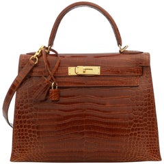 Hermes Kelly 28 miel shiny porosus crocodile bag