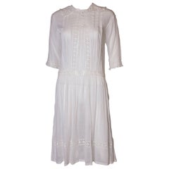 A Vintage edwardian lawn cotton dress with delicate embroidered flowers