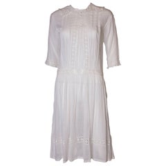 A Antique edwardian lawn cotton dress with delicate embroidered flowers 