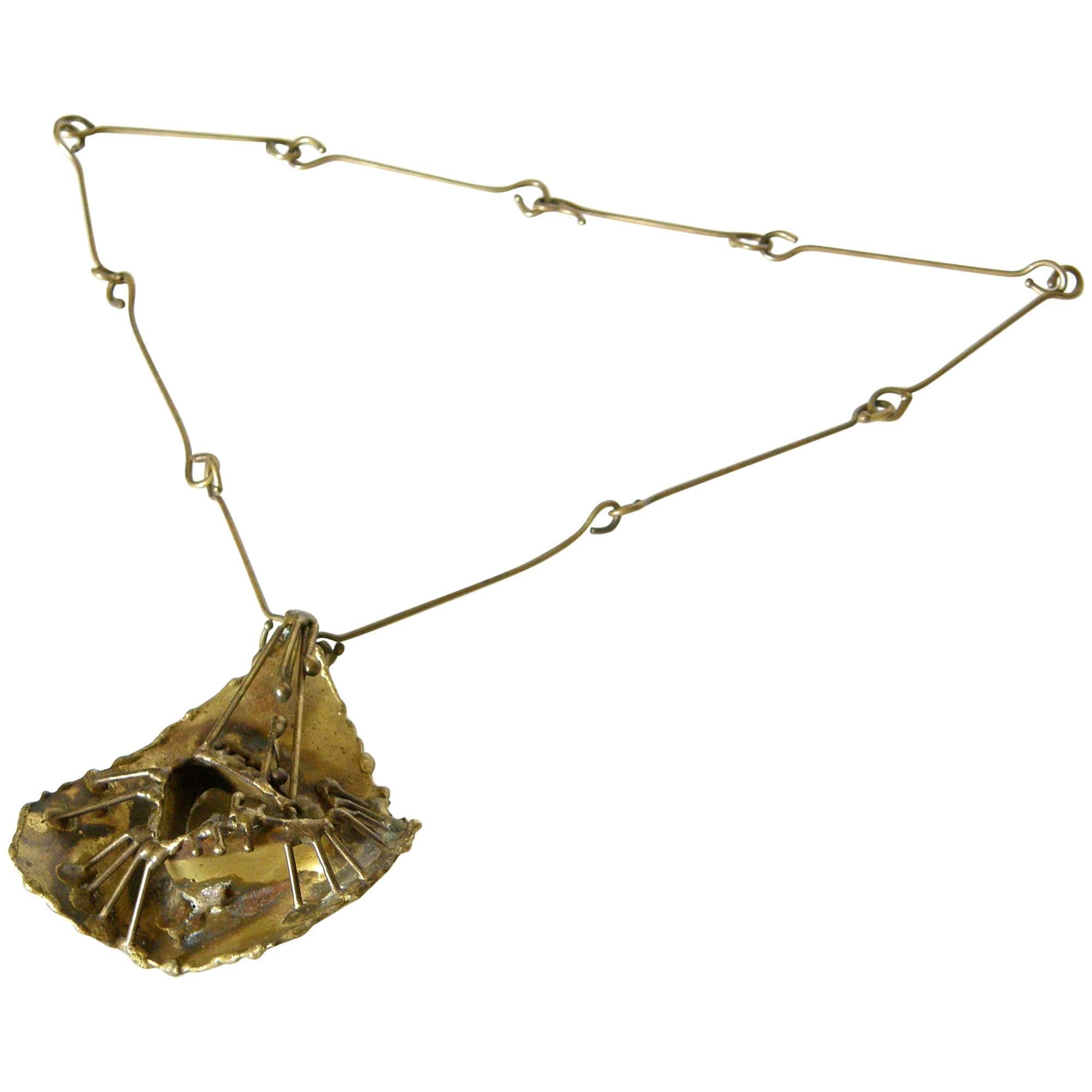 Brutalist Brass Necklace with Sculptural High Relief Pendant For Sale