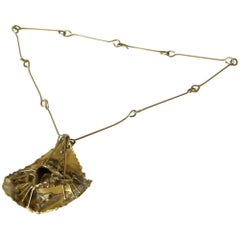 Retro Brutalist Brass Necklace with Sculptural High Relief Pendant