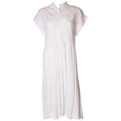 A Vintage 1980s white linen button front day summer dress by Gucci 